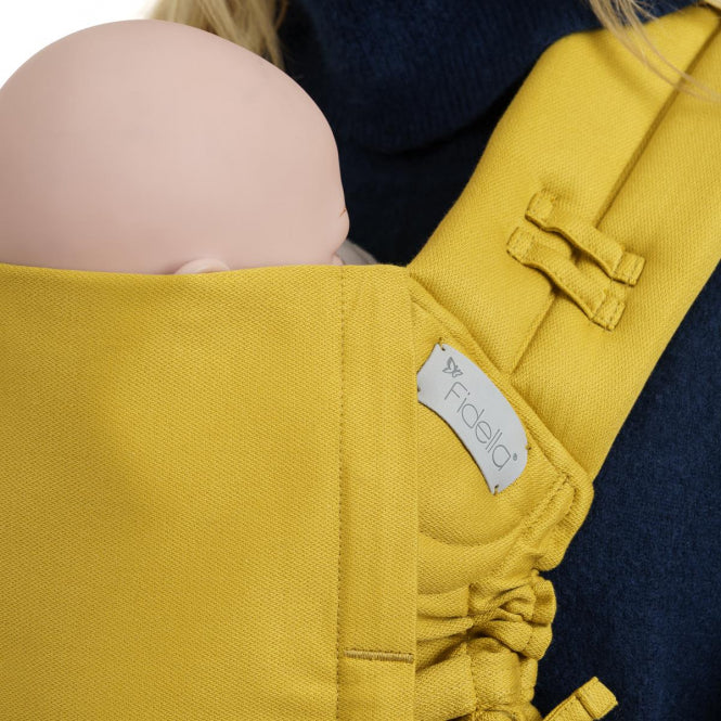 Die Babytrage ist ergonomisch und wächst mit deinem Baby mit